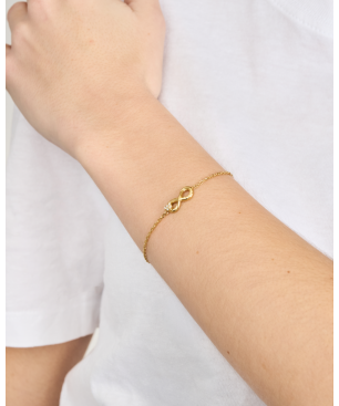 Pulsera GUESS Love Bites Mujer - Cadena Fina de Acero IP Dorado - Detalle Charm Infinito | JUBB06048JWYGS