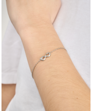Pulsera GUESS Love Bites Mujer - Cadena Fina de Acero Plateado - Detalle Charm Infinito | JUBB06048JWRHS