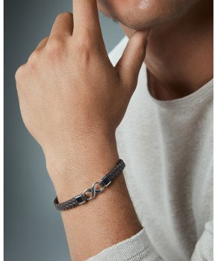 Pulsera VICEROY Magnum Hombre - Piel Trenzada Color Marrón - Detalle Símbolo Infinito de Acero | 21,5 cm | 14331P01011